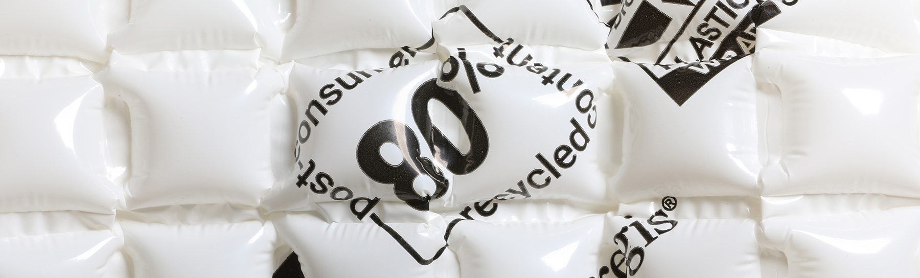 Close-up of inflated AirSpeed® HC Renew PCR made from 80% post-consumer recycled content, featuring printed text and a glossy surface.