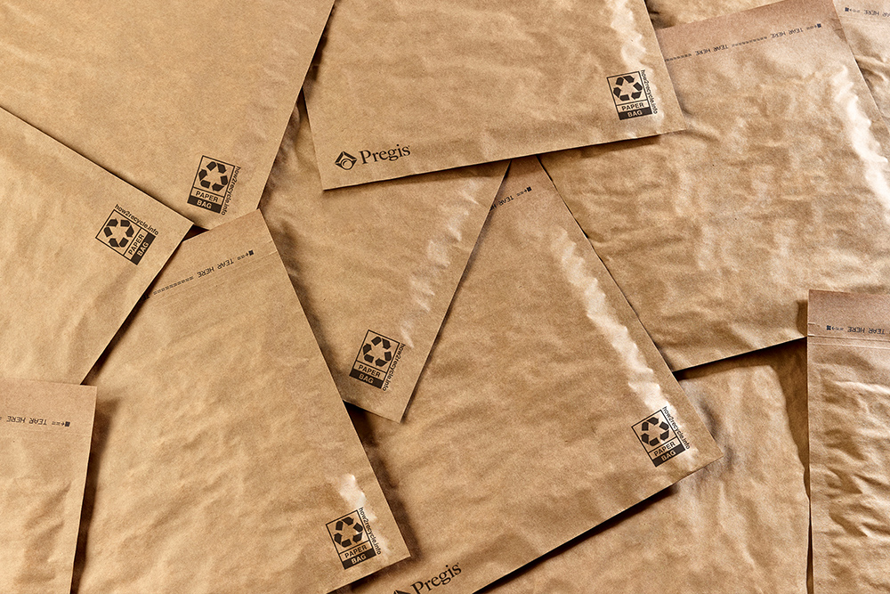 An image featuring EverTec™ mailers, highlighting their durable, curbside recyclable design for sustainable e-commerce shipping.